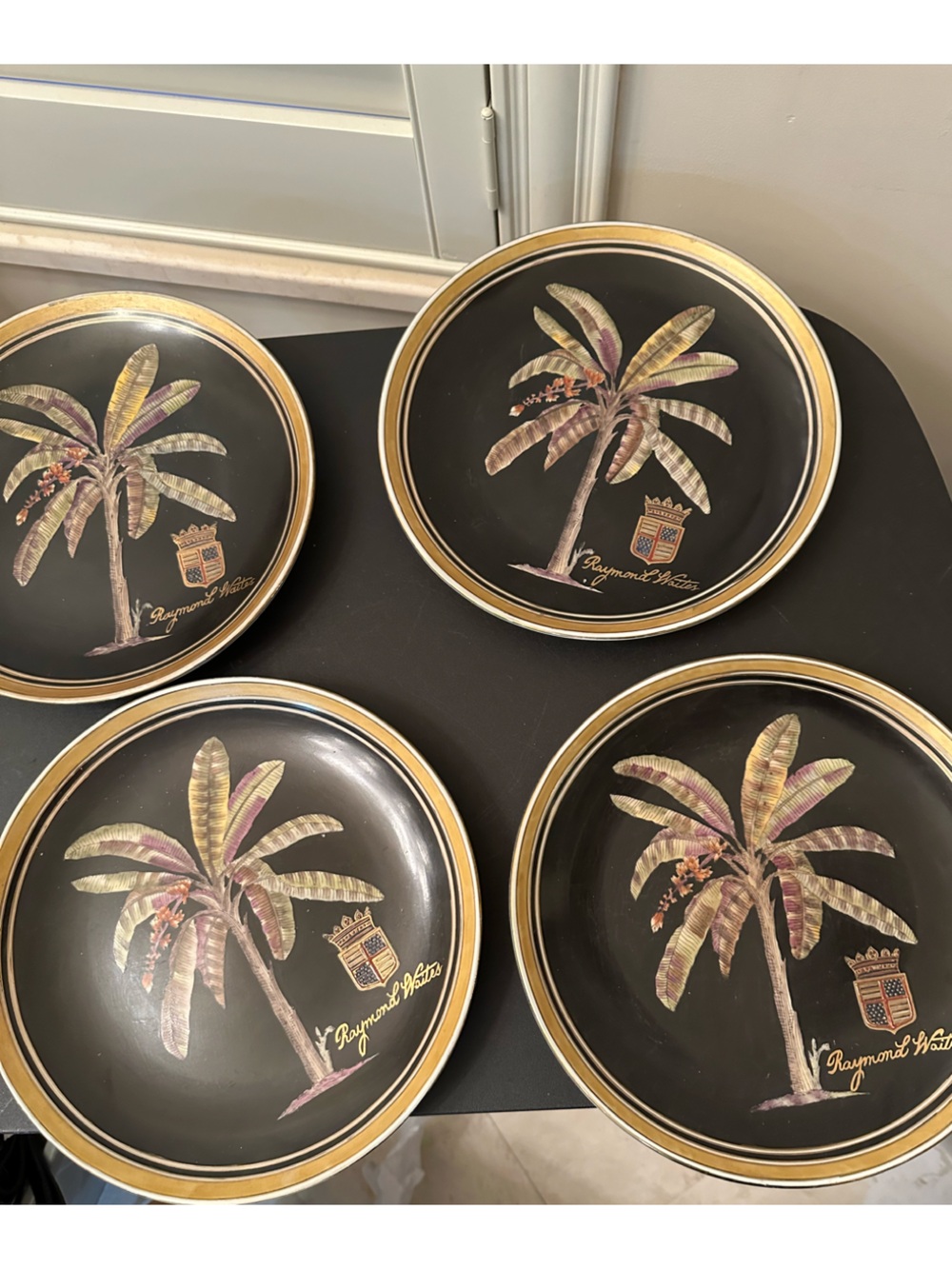 Raymond Waites set of 4 decorative plates